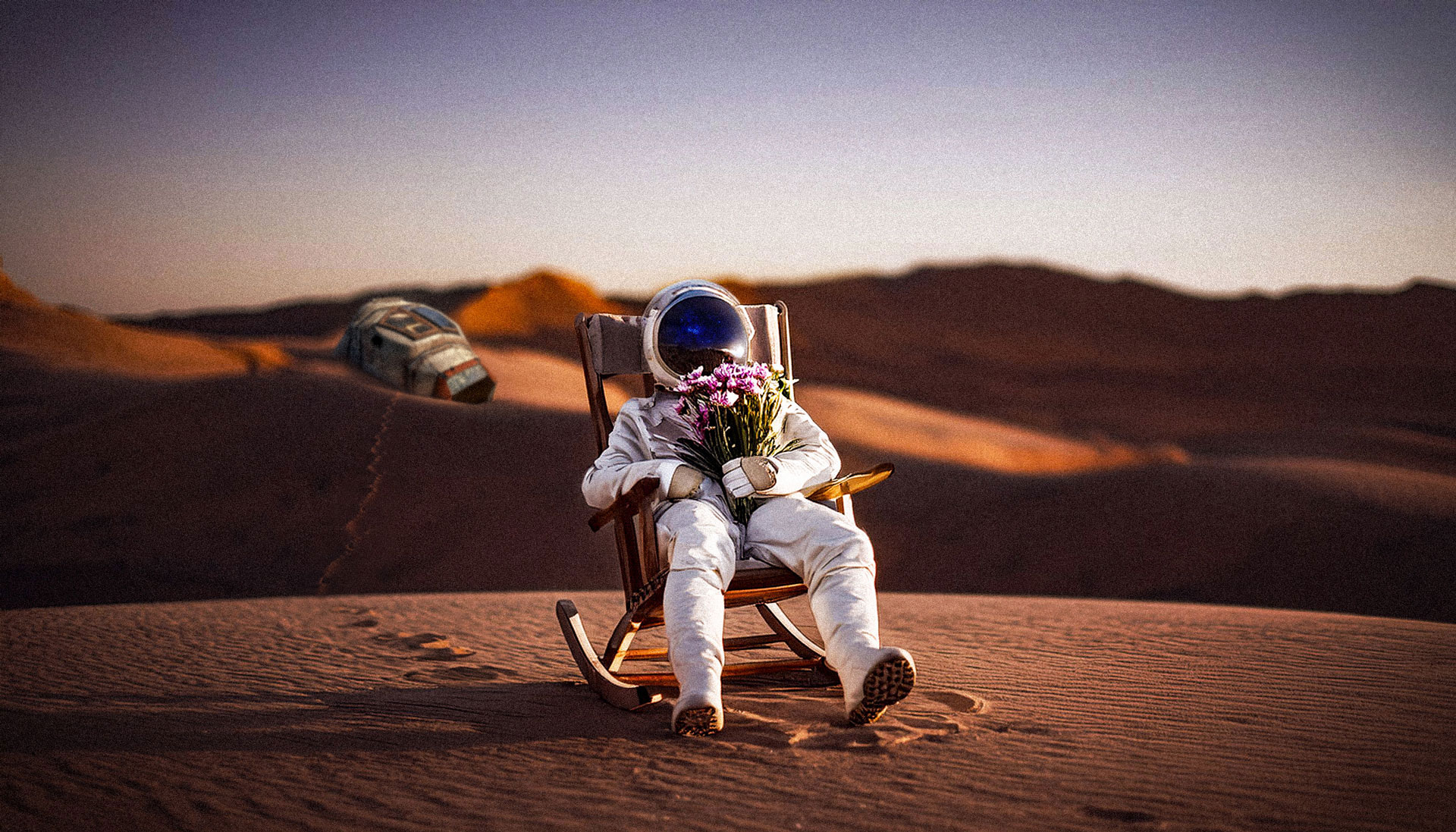 Astronaute assis dans un rocking-chair dans le desert by StephaneHuve